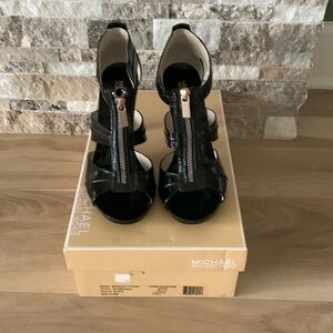 Michael Kors crinkled patent Berkley T strap sandal. Worn once. Like new